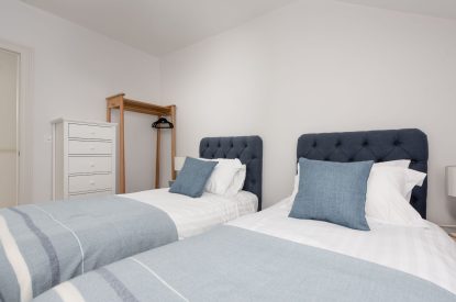A twin bedroom at Watergate House, Cornwall