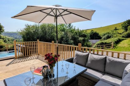 The sun deck and hot tub at Bracken Barn, Devon
