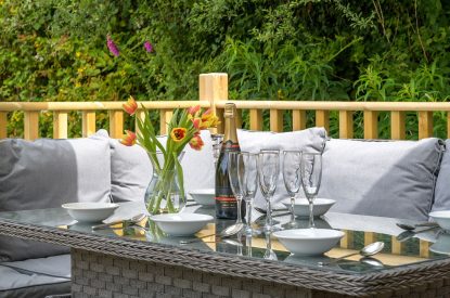 Outdoor seating area at Bracken Barn, Devon