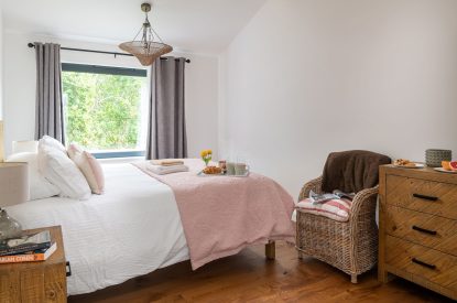 A king size bedroom at Bracken Barn, Devon