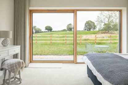 A king sized bedroom at Kingfisher Forge, Shropshire