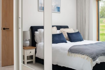 A king sized bedroom at Kingfisher Forge, Shropshire