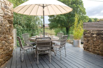 Outdoor dining area at The Old Post Office, Cotswolds