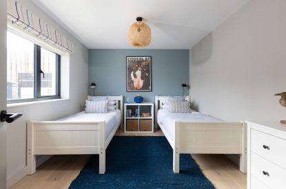 A twin bedroom at Tamarind Tide, Cornwall