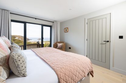 A king sized bedroom at Tamarind Tide, Cornwall