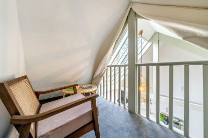 The snug mezzanine area at The Enchanted Cottage, Cornwall