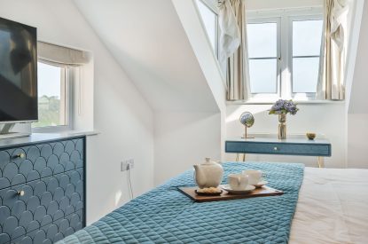 A king size bedroom at Azure Escape, Cornwall