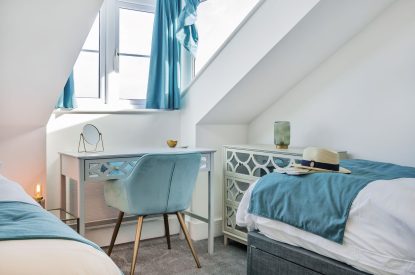 A twin bedroom at Azure Escape, Cornwall