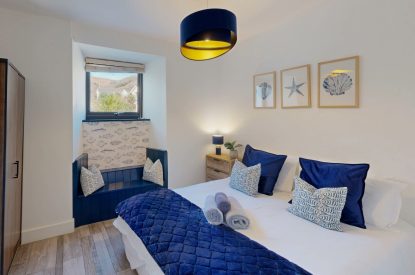 A king size bedroom at The Tide House, Cornwall