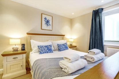 A king size bedroom at Tranquil Shores, Cornwall