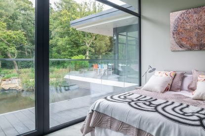 A king sized bedroom at The Bridge House, Hampshire