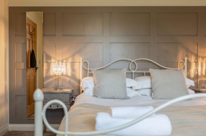 A king sized bedroom at Primrose Cottage, Yorkshire