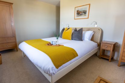 A king size bedroom at Sunset Sands, Cornwall