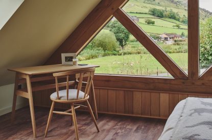 A king size bedroom at Hay Barn, Powys