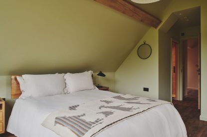 A king size bedroom at Hay Barn, Powys