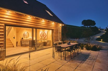 Outdoor dining area at Hay Barn, Powys