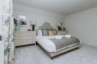 A king size bedroom at Havenwood, Oxfordshire