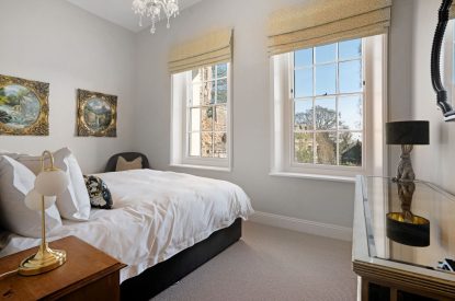 A super-king sized bedroom at Priory West Gate, Essex