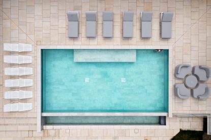 The swimming pool terrace at Halo House, Cotswolds