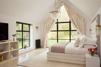A king-size bedroom at Halo House, Cotswolds 
