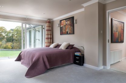 A super-king size bedroom at Southwoods, Hampshire