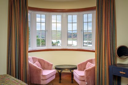 A super-king size bedroom at An Taigh Geal, Argyll and Bute