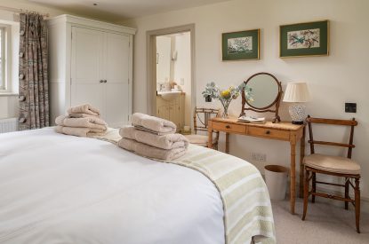 A super king-size bedroom at Buxton Farmhouse, Norfolk