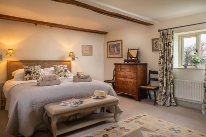A super king-size bedroom at Buxton Farmhouse, Norfolk