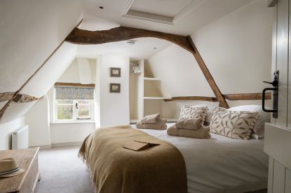 A super king-size bedroom at Buxton Farmhouse, Norfolk