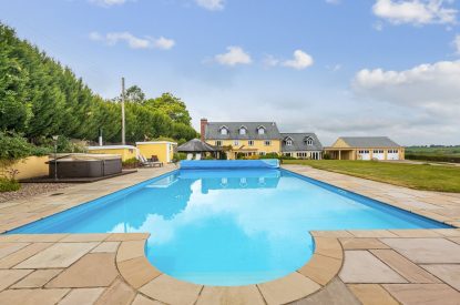 The heated swimming pool at Broadridge Manor, Devon
