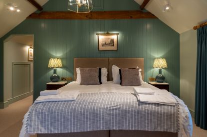 A super-king size bedroom at Parkview Farmhouse, Somerset