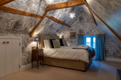 A super-king size bedroom at Parkview Farmhouse, Somerset