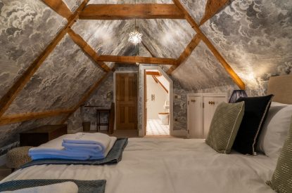 A super-king size bedroom at Parkview Farmhouse, Somerset