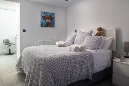 A king-size bedroom at The Tractor Shed, Worcestershire