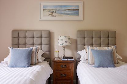 A twin bedroom at Georgian House, Devon