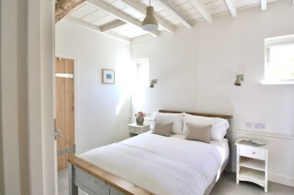 The bedroom in Gull Farm Barn, with a double bed