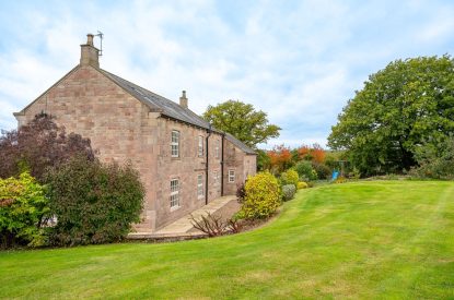 The private lawned garden at Tinkers Folly, Yorkshire