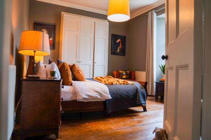 A super king size bedroom at Meadfoot Manor, Torquay, Devon