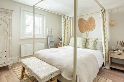 A king size bedroom at Coral House, Dorset