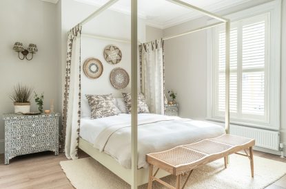 A king size bedroom at Coral House, Dorset