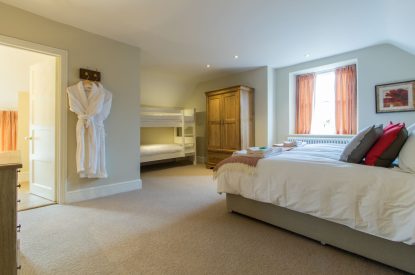 A family bedroom at Hawthorn Farmhouse, Somerset