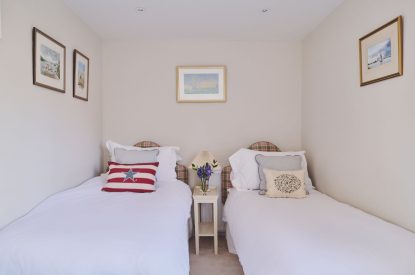A twin bedroom at Hockham House, Norfolk Coast