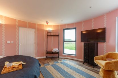 A king-sized bedroom at Penelope's Tower, Wiltshire