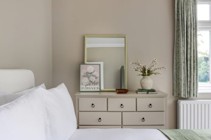 A king sized bedroom at Merry Manor, Essex