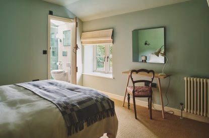 A king size bedroom at Mill House, Powys