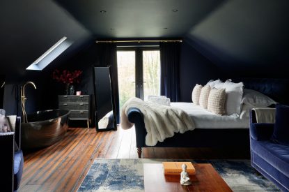 A king-size bedroom at Halo House, Cotswolds