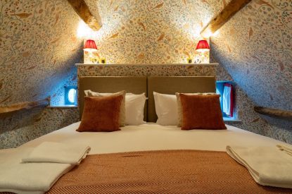 A super-king size bedroom at Parkview Farmhouse, Somerset