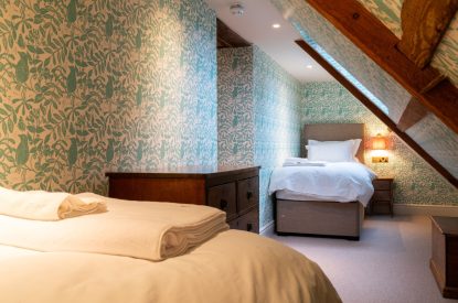 A twin bedroom at Parkview Farmhouse, Somerset