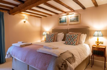 A super-king size bedroom at Parkview Farmhouse, Somerset