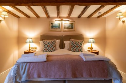 A super-king size bedroom at Parkview Farmhouse, Somerset